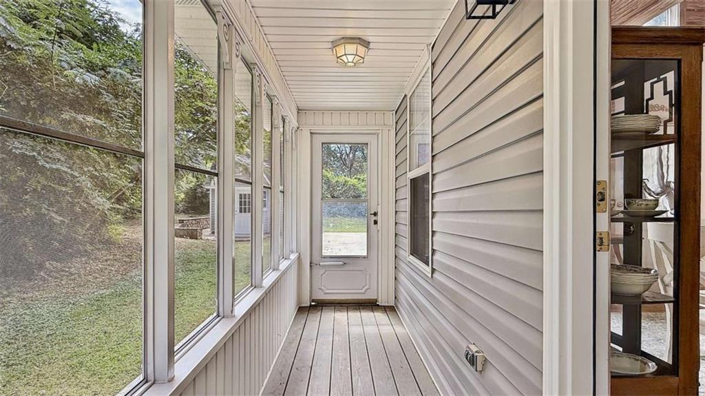 148 Simmons Street Trion, GA 30753 - Photo 58 of 73 a view of a balcony with wooden floor and stairs