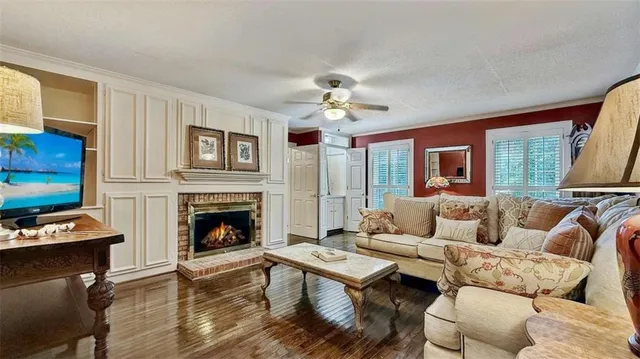 a kitchen with white cabinets and appliances