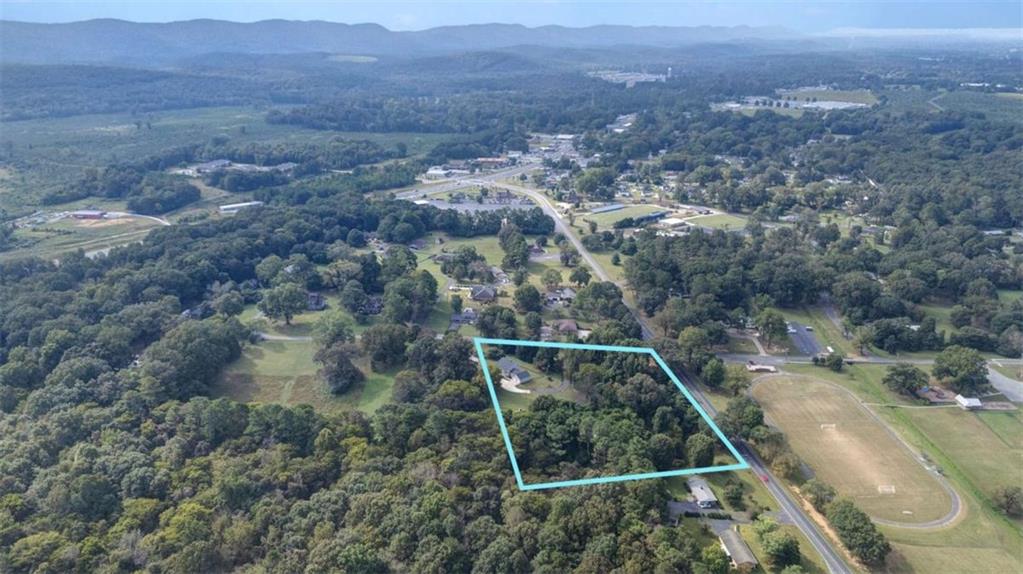 148 Simmons Street Trion, GA 30753 - Photo 71 of 73 an aerial view of house with yard and mountain view in back