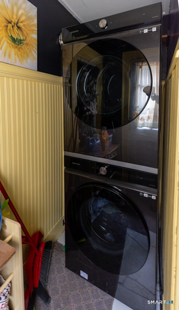 36 Music Vale Road Salem, CT 06420 - Photo 24 of 44 The stackable washer/dryer are tucked in a laundry alcove in the kitchen area . . .