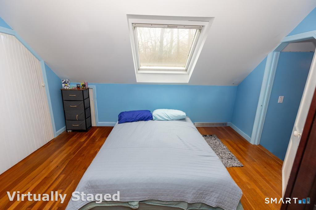 36 Music Vale Road Salem, CT 06420 - Photo 29 of 44 bedroom #3 has nice hardwood floors and a pretty skylight .