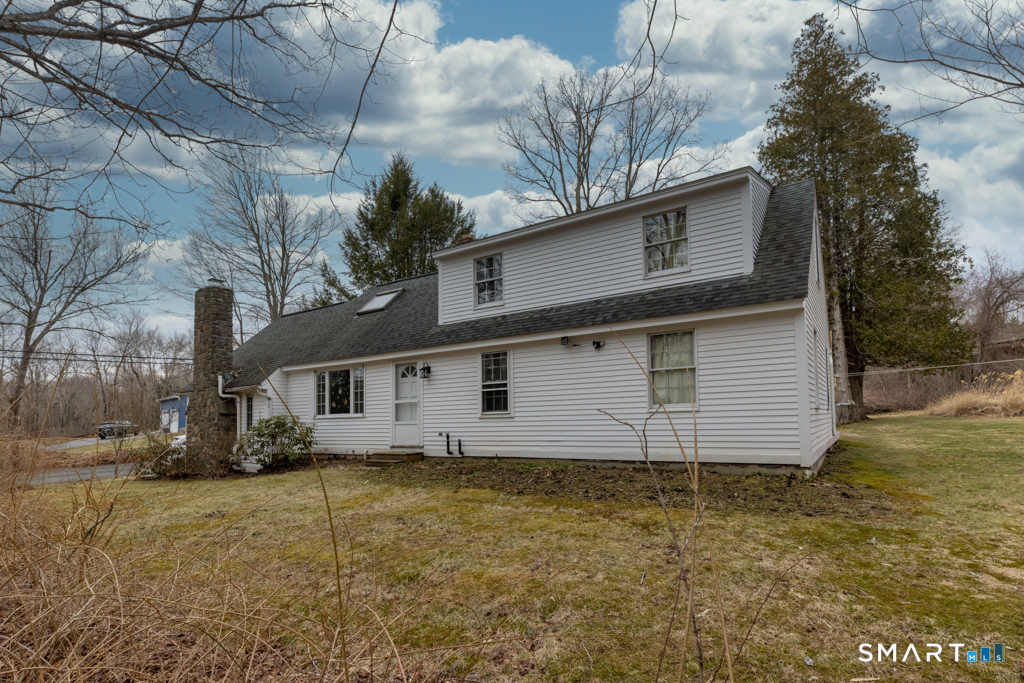 36 Music Vale Road Salem, CT 06420 - Photo 4 of 38 The front yard faces the woodlands . . . bordered by beautiful forsythia bushes - ready to bloom!