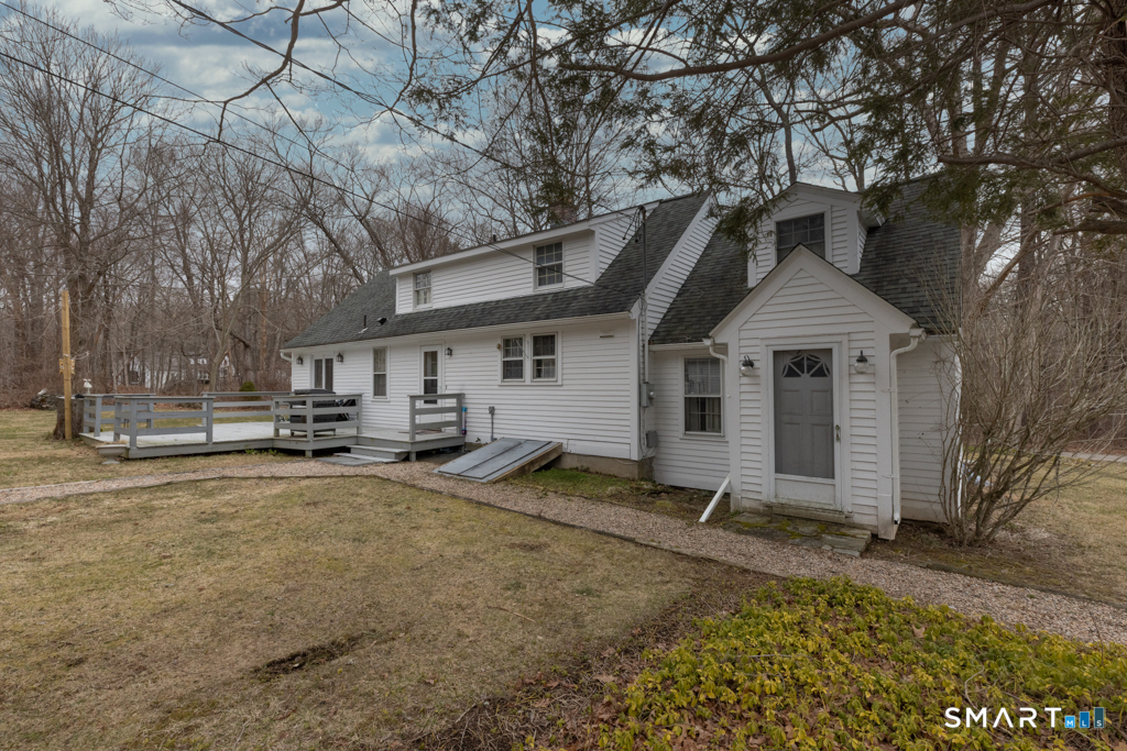 36 Music Vale Road Salem, CT 06420 - Photo 5 of 38 There is an expansive deck for outdoor enjoyment . . .