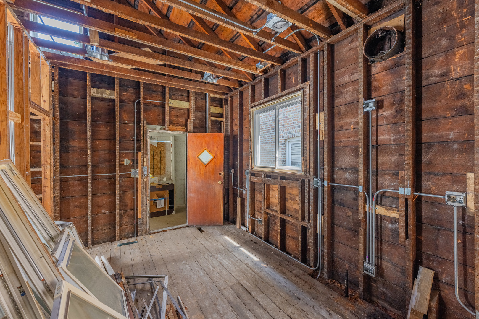 5247 South May Street Chicago, IL 60609 - Photo 12 of 23 a view of an entryway with wooden floor