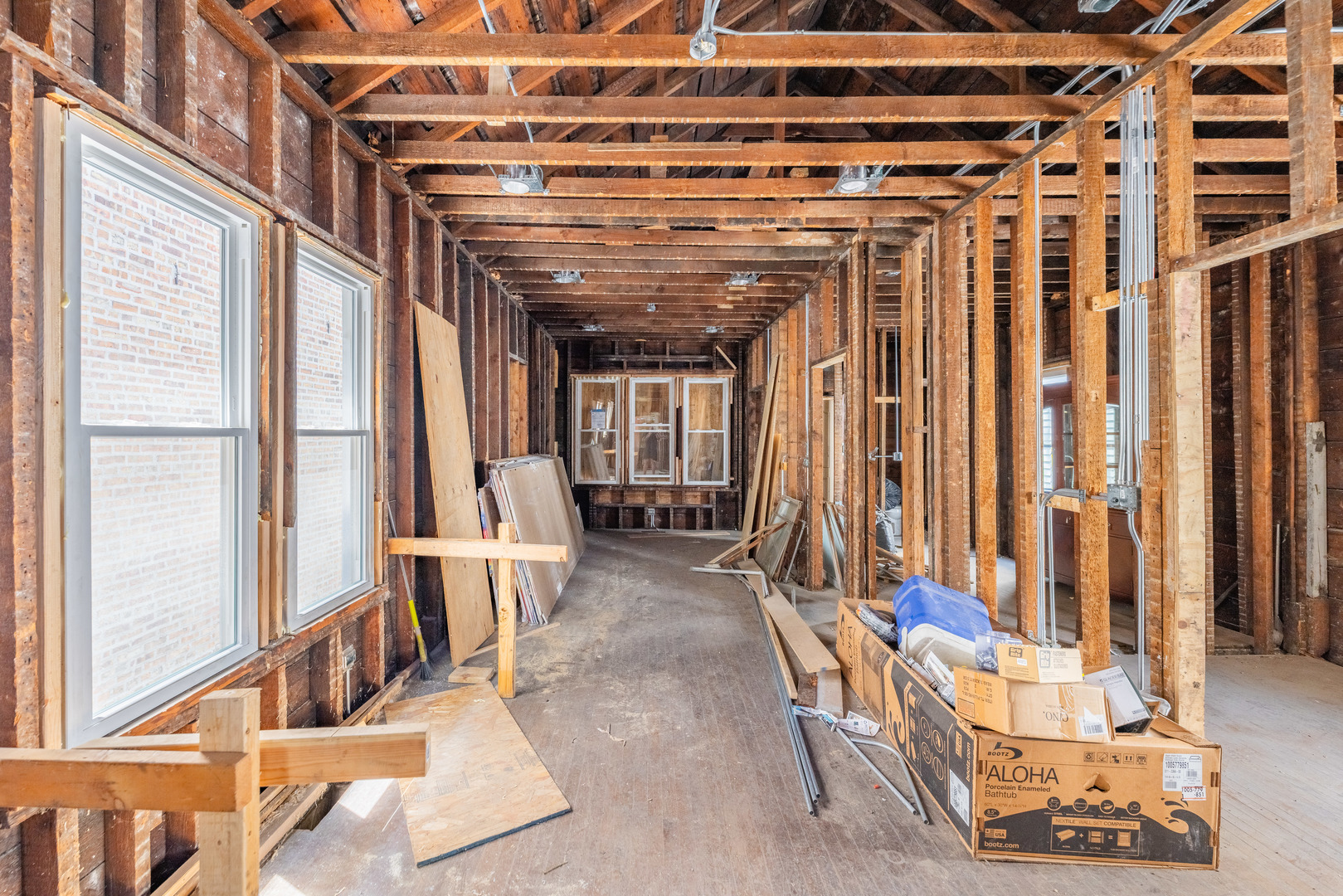 5247 South May Street Chicago, IL 60609 - Photo 13 of 23 a living room with furniture and large windows