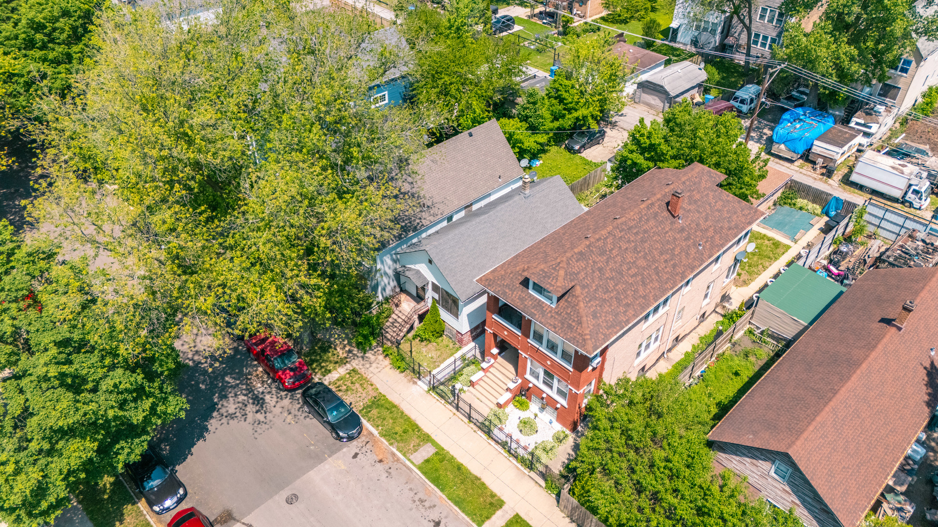 5247 South May Street Chicago, IL 60609 - Photo 21 of 23 an aerial view of a house with a garden