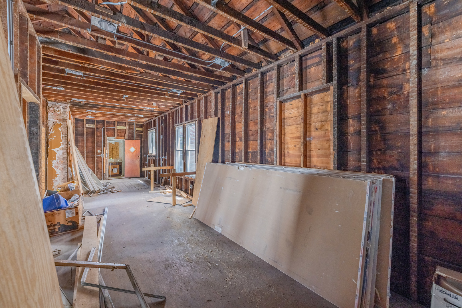5247 South May Street Chicago, IL 60609 - Photo 7 of 23 a view of livingroom with furniture and floor to ceiling window
