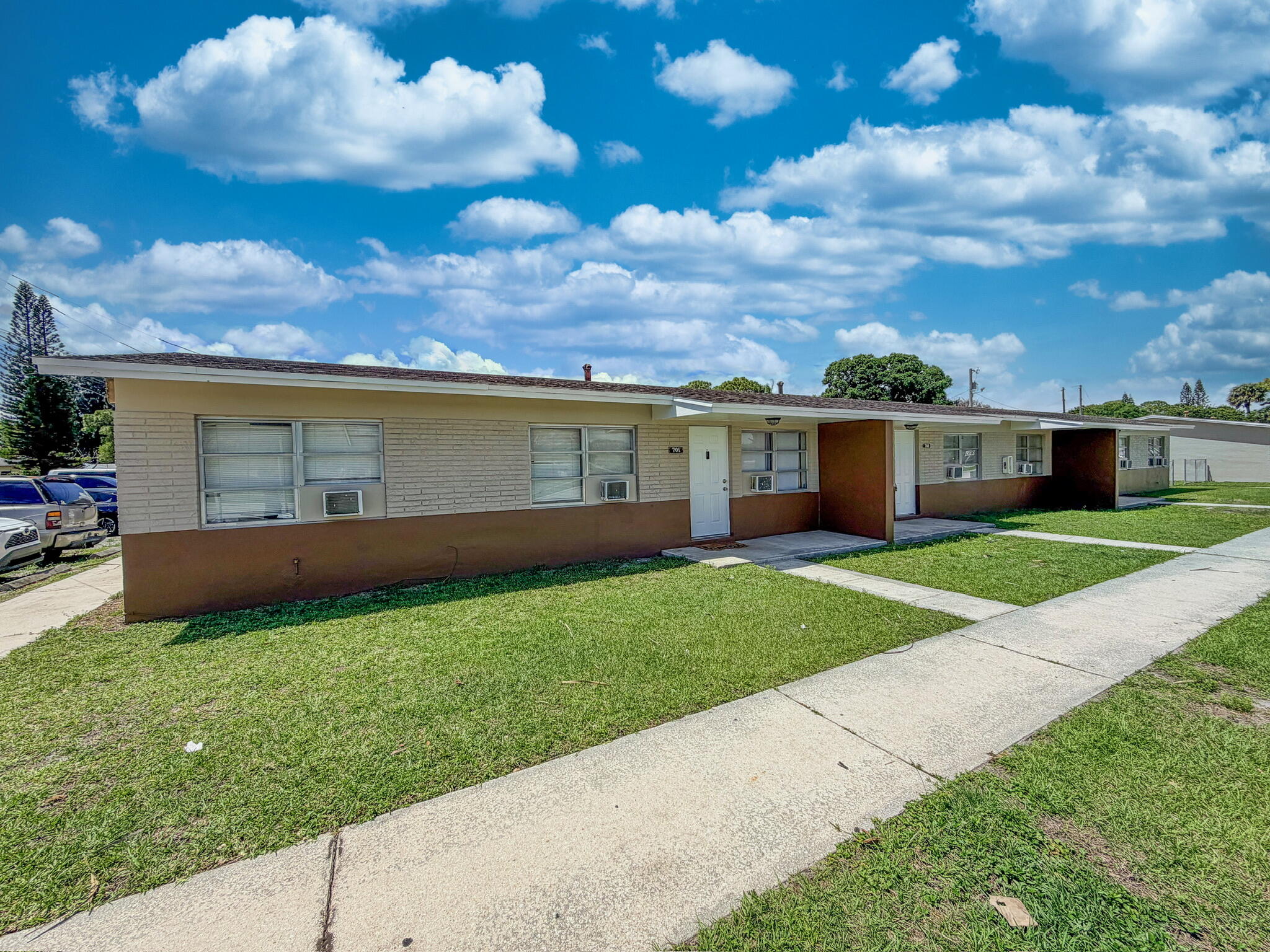 703 North 25th Street Fort Pierce, FL 34947 - Photo 1 of 16 a view of a house with a yard