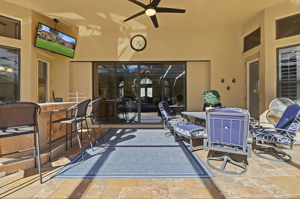 1416 North Ridge Meadow Path Hernando, FL 34442 - Photo 54 of 68 a living room with furniture a air conditioner and a table