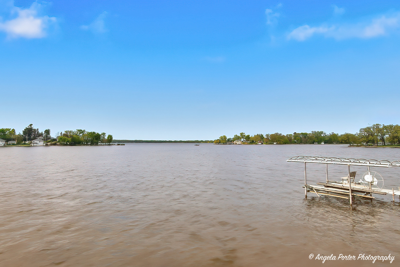 35166 Lake Shore Road Ingleside, IL 60041 - Photo 31 of 39 a view of lake with table and chairs