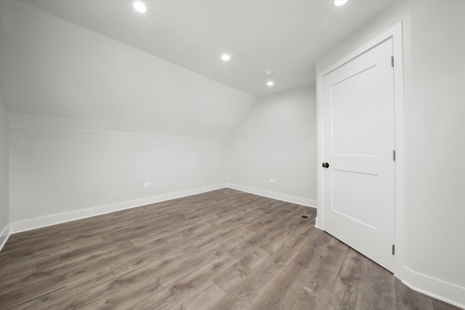 7356 South Kenwood Avenue Chicago, IL 60619 - Photo 19 of 27 a view of empty room with wooden floor