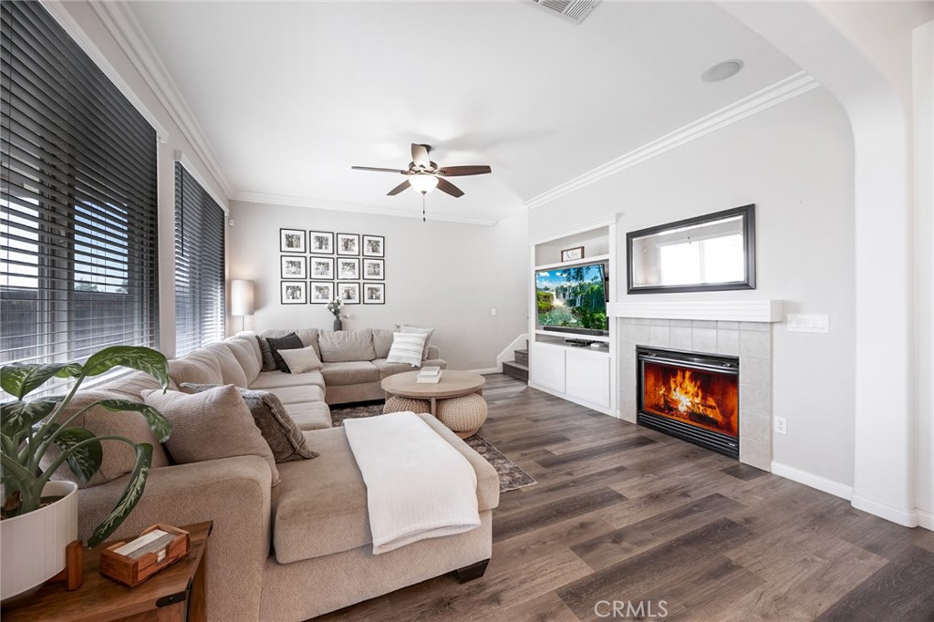 33345 Wallace Way Yucaipa, CA 92399 - Photo 20 of 38 a living room with furniture fireplace and window