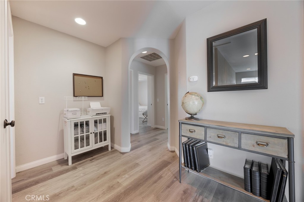 33345 Wallace Way Yucaipa, CA 92399 - Photo 24 of 38 a view of a livingroom with furniture and wooden floor