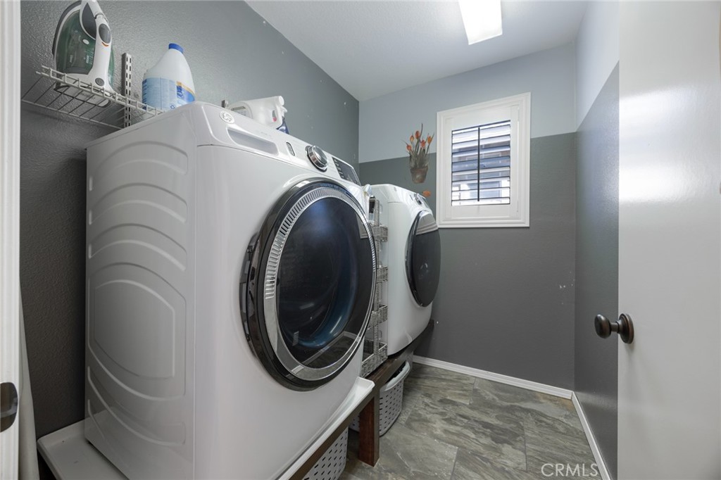 33345 Wallace Way Yucaipa, CA 92399 - Photo 27 of 38 a utility room with dryer and washer