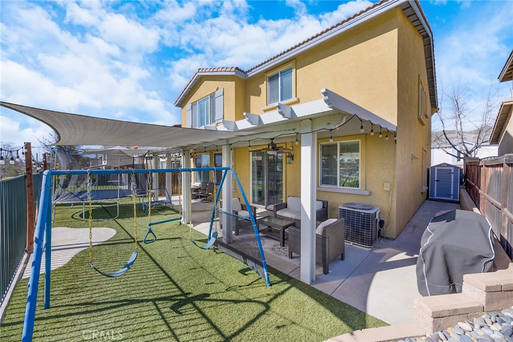 33345 Wallace Way Yucaipa, CA 92399 - Photo 34 of 38 a view of a house with swimming pool and sitting area