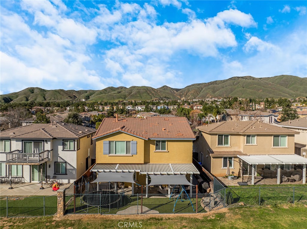 33345 Wallace Way Yucaipa, CA 92399 - Photo 4 of 38 a front view of a houses with a yard