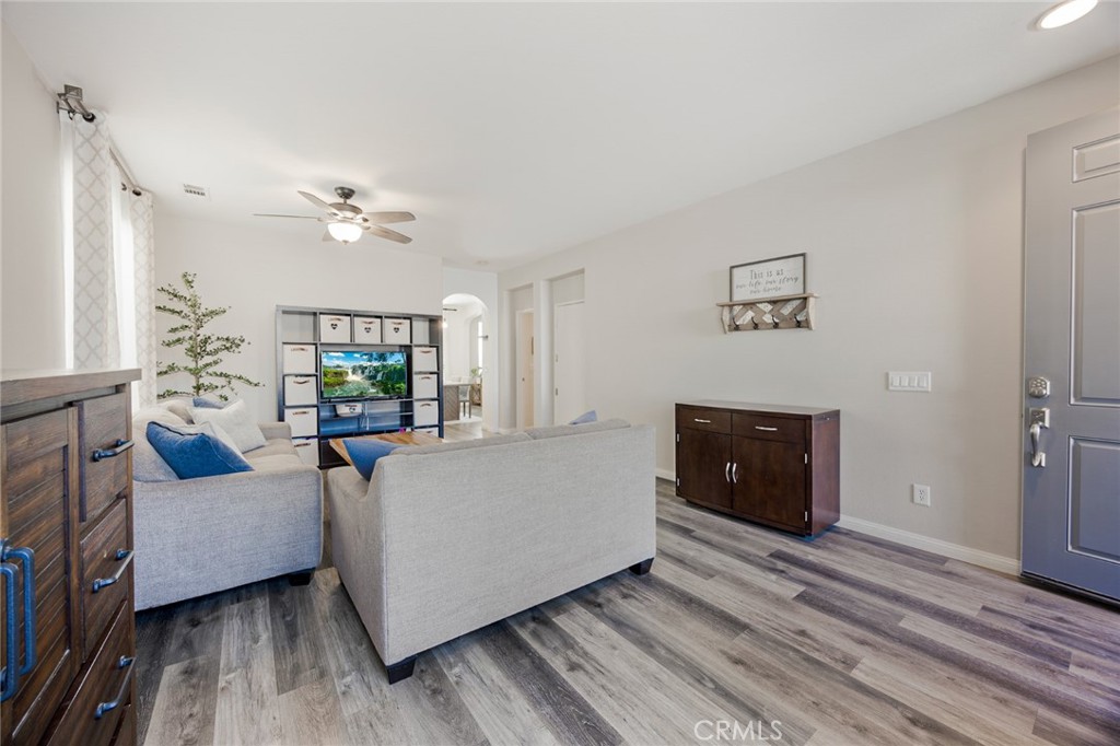 33345 Wallace Way Yucaipa, CA 92399 - Photo 10 of 38 a living room with furniture and a fireplace