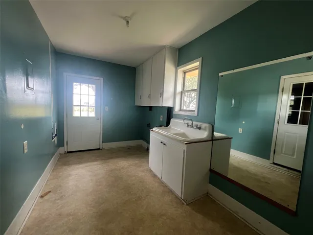 a view of utility room and window