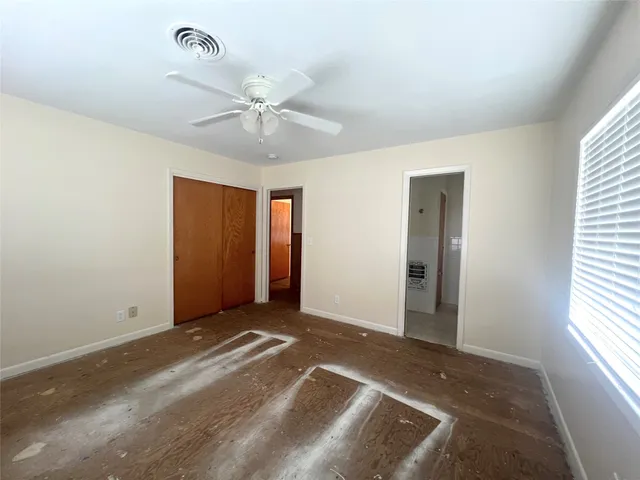 a view of an empty room and window