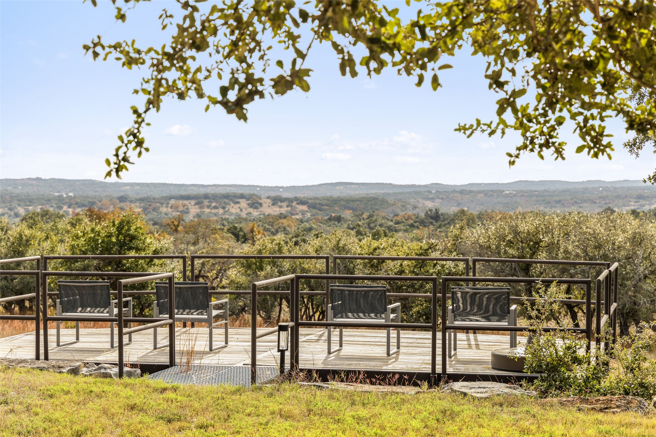 751 Prochnow Road Dripping Springs, TX 78620 - Photo 29 of 40 Exterior space with a deck with mountain view