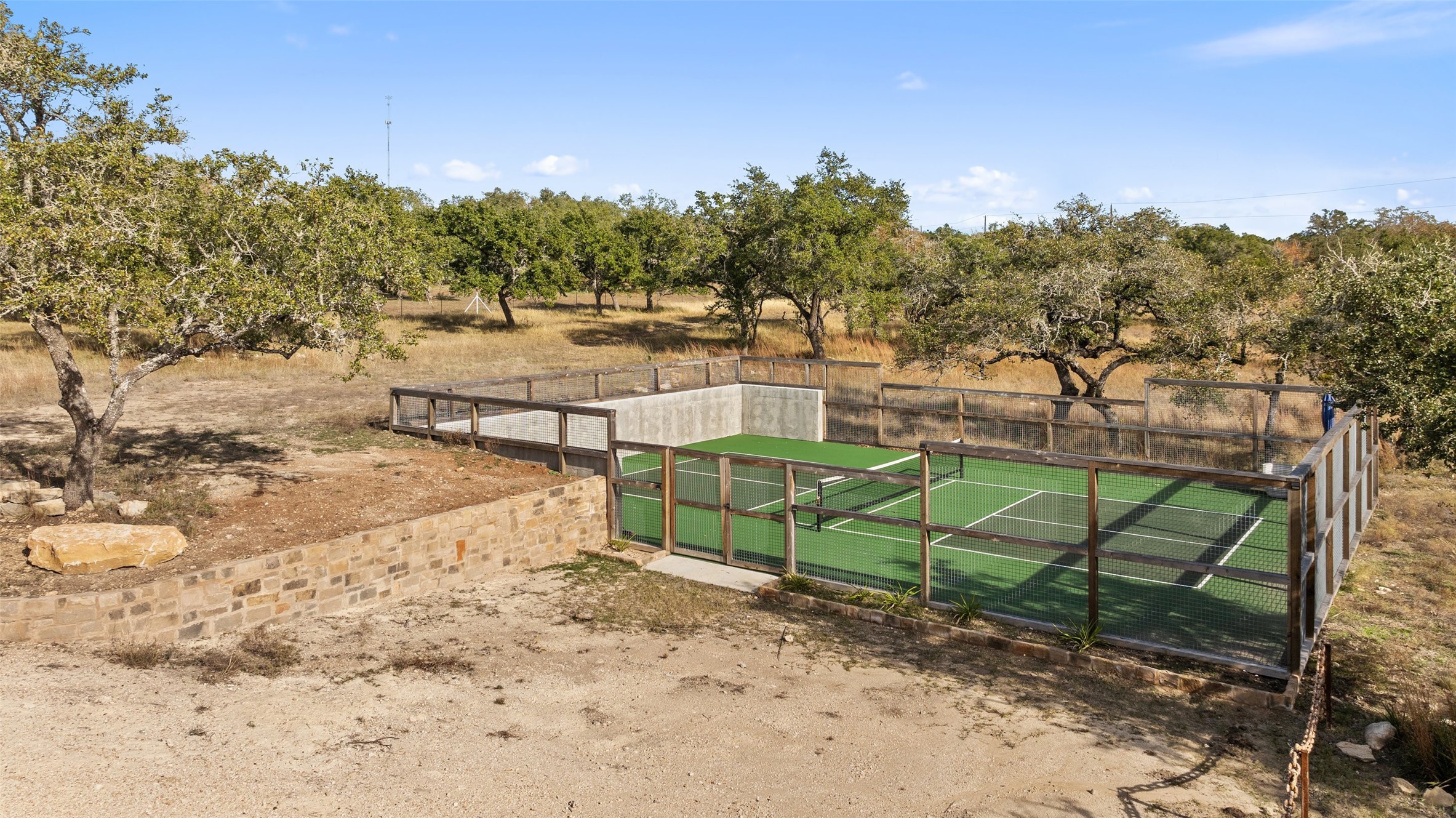 751 Prochnow Road Dripping Springs, TX 78620 - Photo 37 of 40 Exterior space featuring a rural view