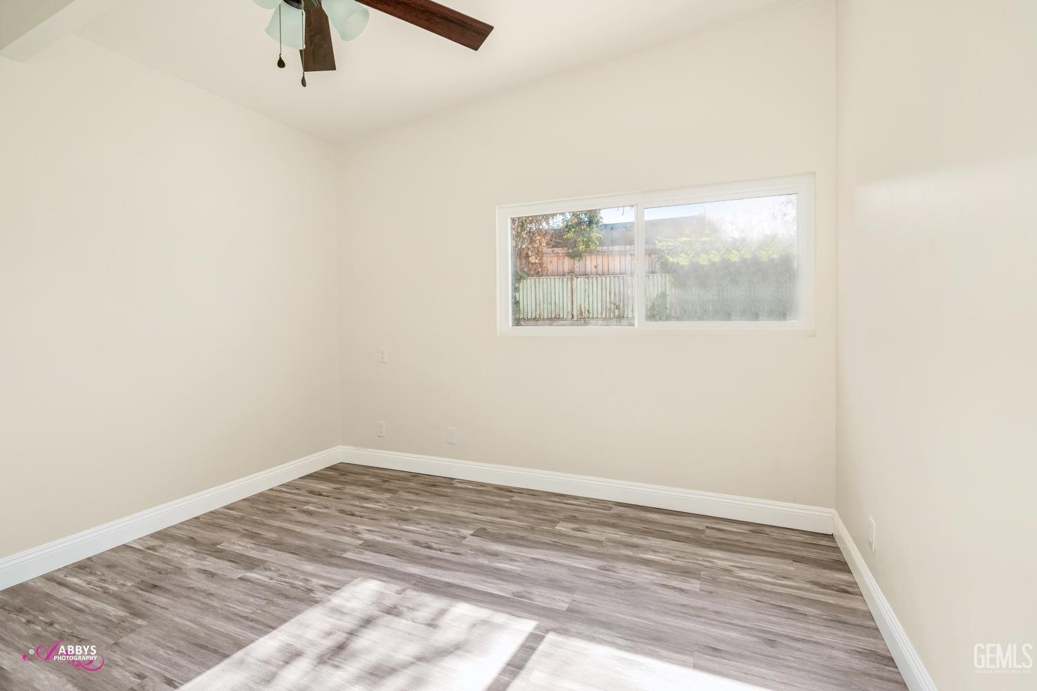 Undisclosed Address Bakersfield, CA 93306 - Photo 22 of 32 a view of a room with wooden floor