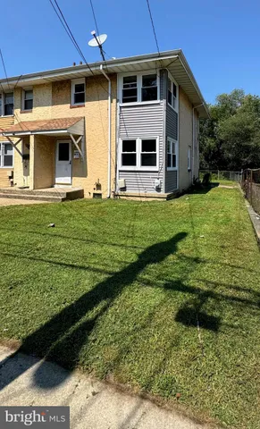 a view of a back yard of the house