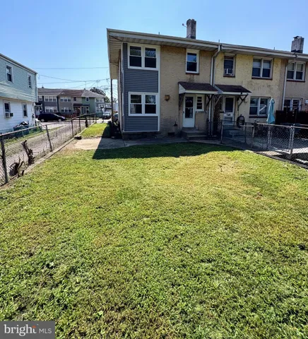 a front view of a house with swimming pool