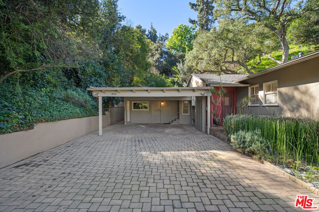 3621 Longview Valley Road Sherman Oaks, CA 91423 - Photo 25 of 25 a front view of a house with a garden