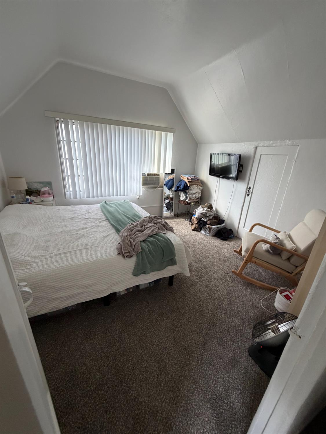 607 East Marshall Street Turlock, CA 95380 - Photo 9 of 9 a bedroom with bed and window