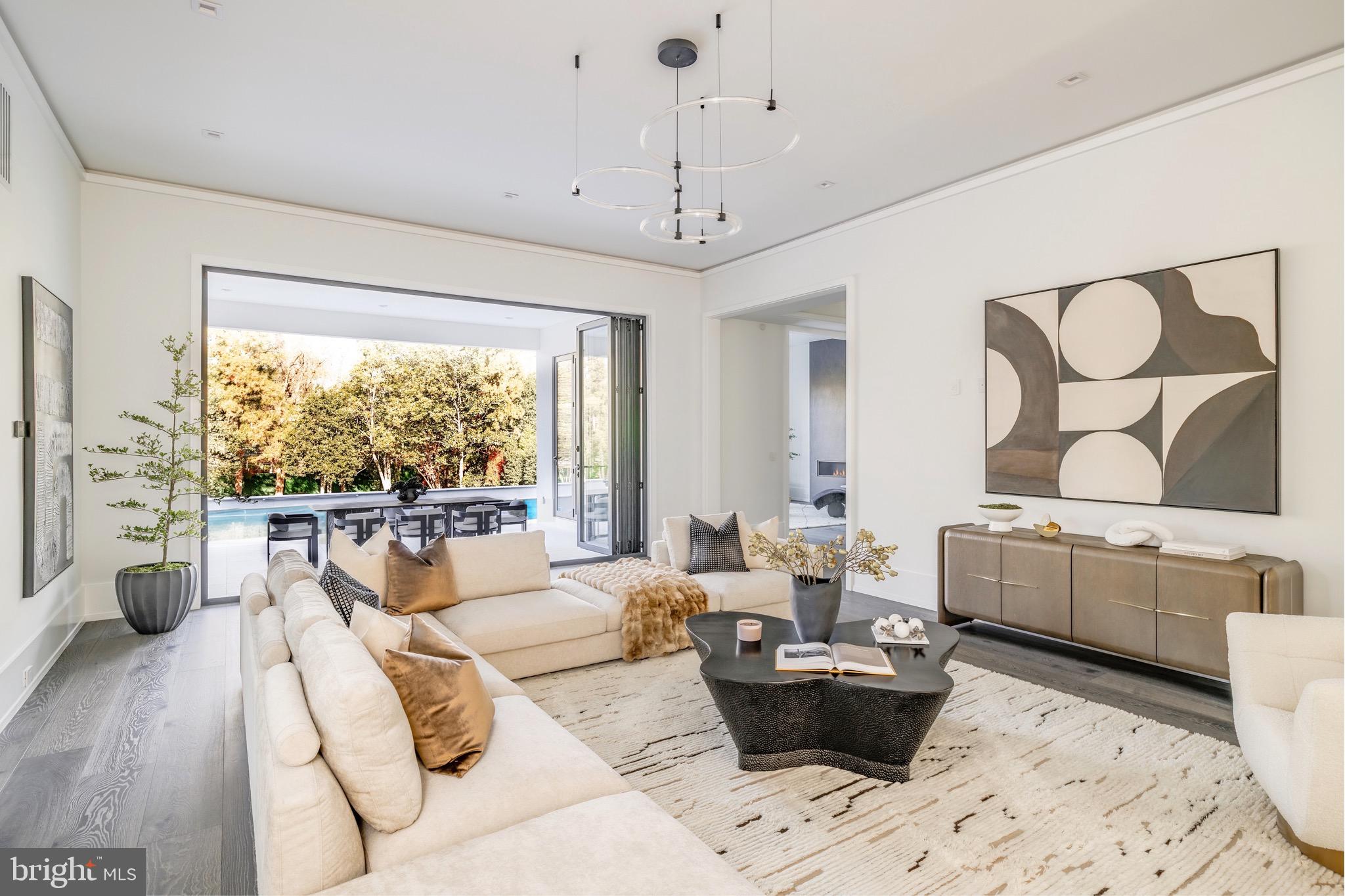 1102 Chain Bridge Road McLean, VA 22101 - Photo 11 of 50 a living room with furniture and a large window