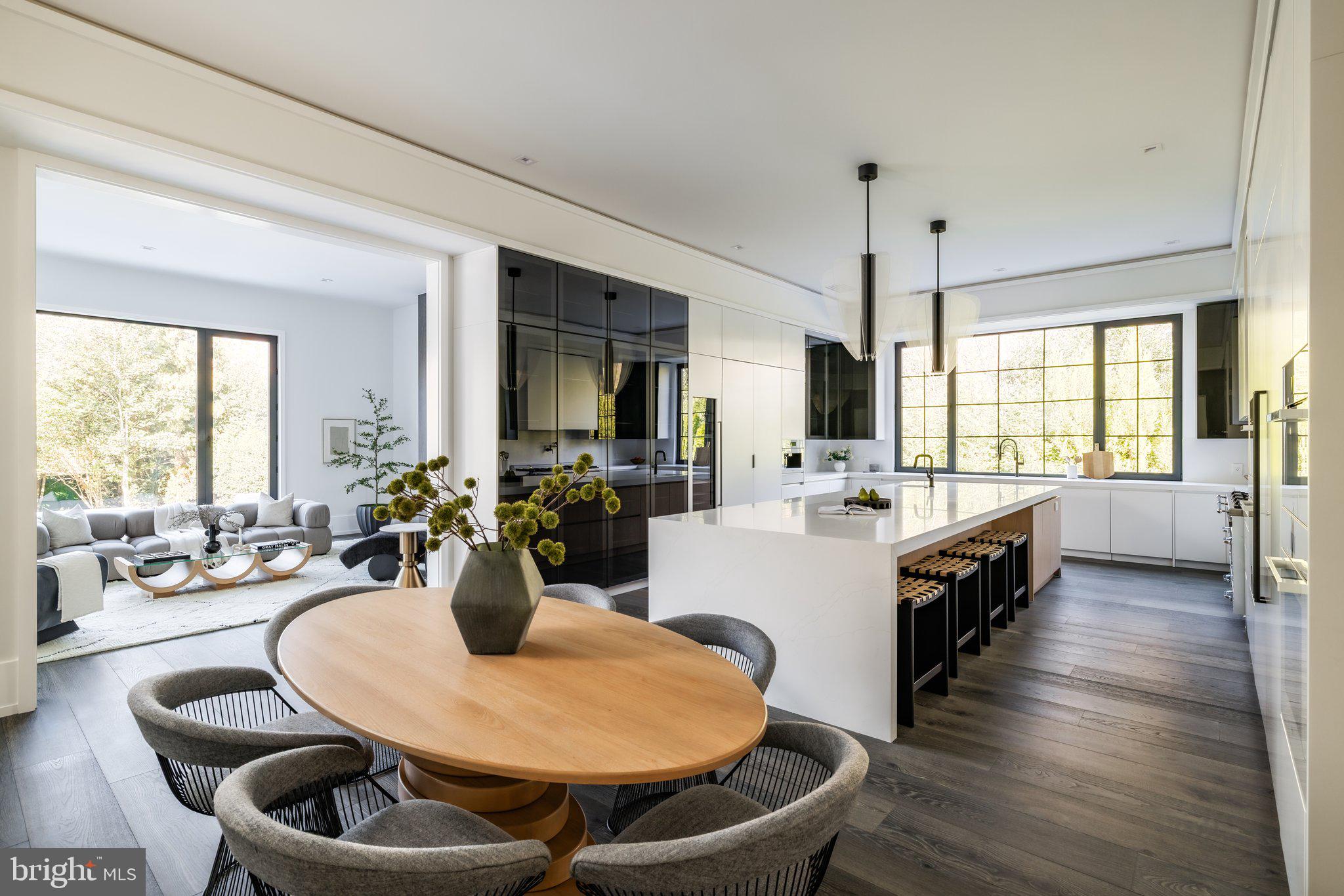 1102 Chain Bridge Road McLean, VA 22101 - Photo 22 of 50 a large kitchen with a table and chairs