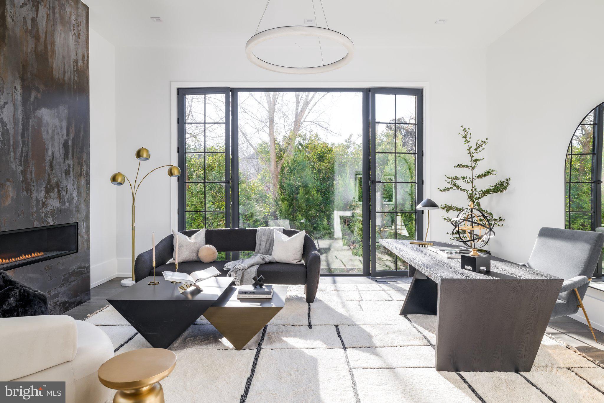 1102 Chain Bridge Road McLean, VA 22101 - Photo 25 of 50 a living room with furniture and a large window
