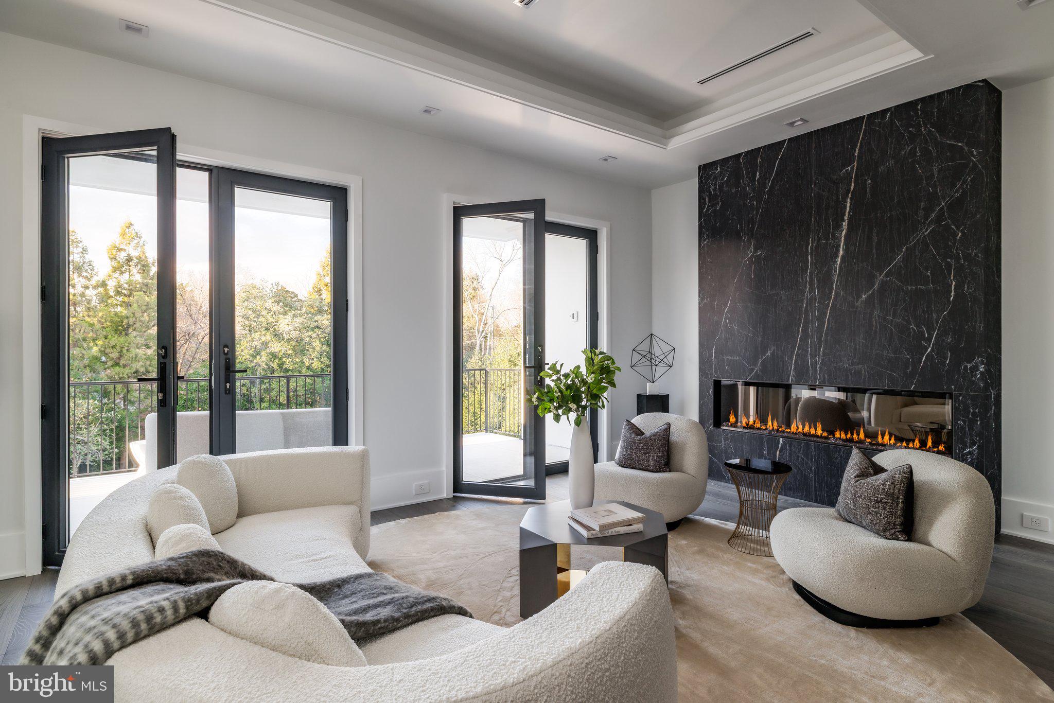 1102 Chain Bridge Road McLean, VA 22101 - Photo 29 of 50 a living room with furniture and a large window