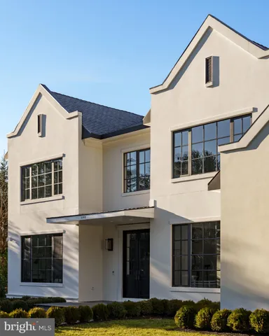a front view of a house with garage