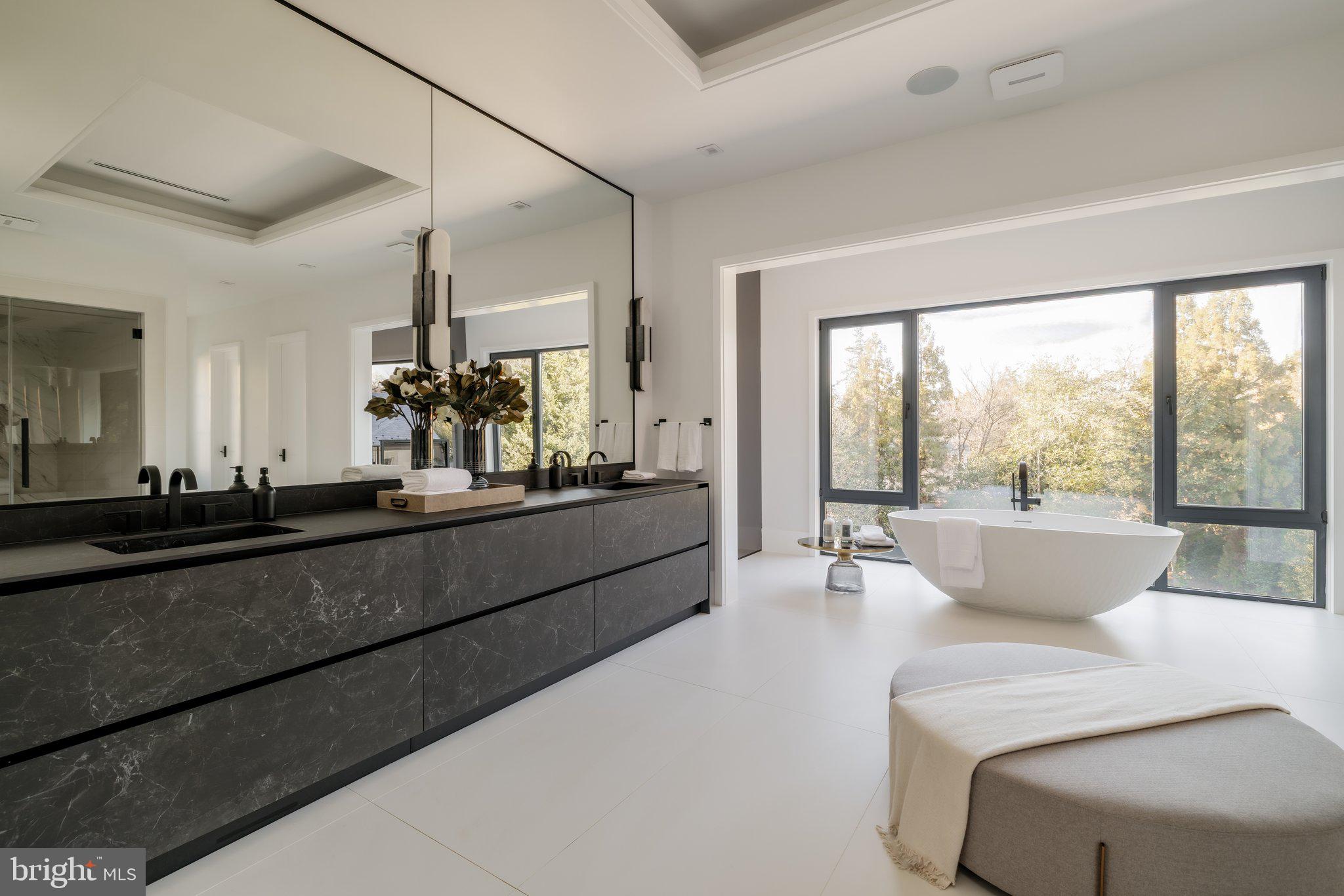 1102 Chain Bridge Road McLean, VA 22101 - Photo 33 of 50 a living room with furniture and a large window