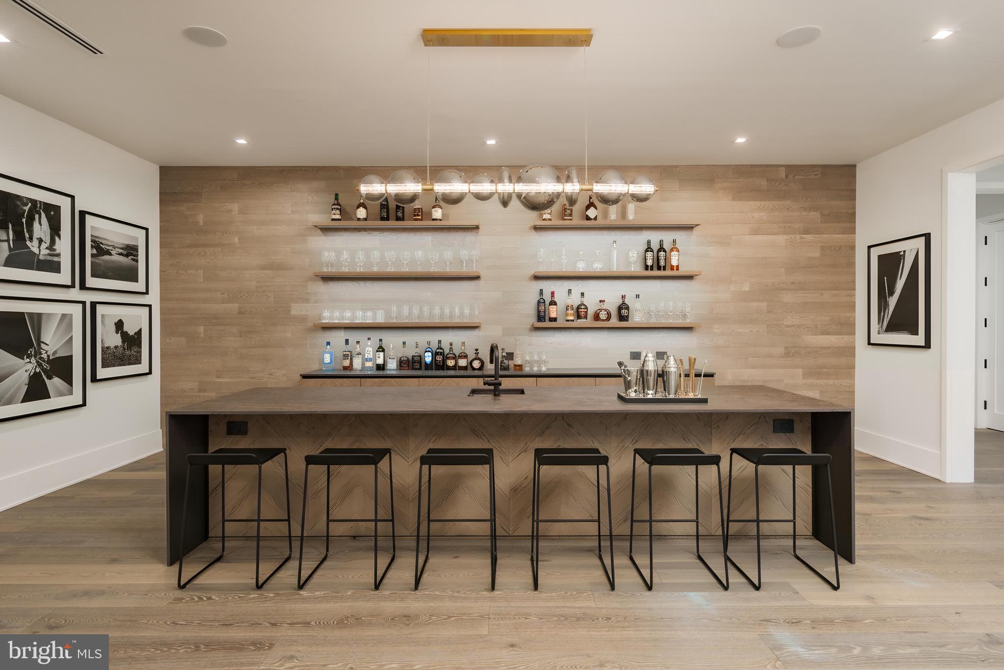 1102 Chain Bridge Road McLean, VA 22101 - Photo 42 of 50 a kitchen with a table and chairs in it