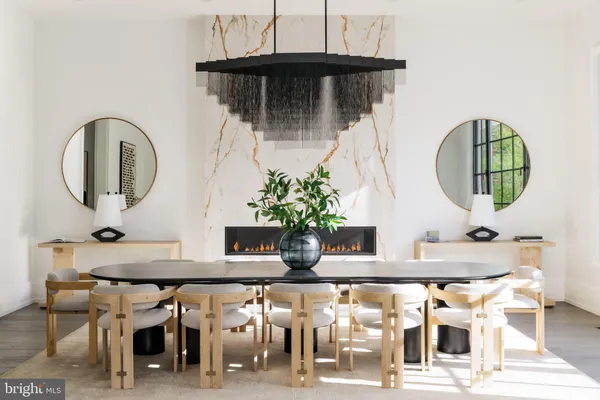 a table with chairs in front of it