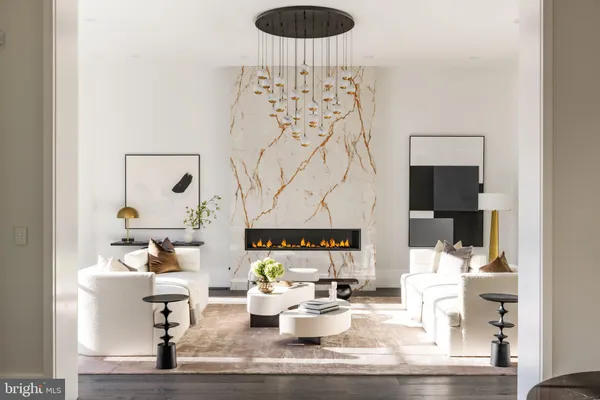 a living room with furniture and a table
