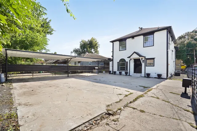 a view of a house with a snow in the background