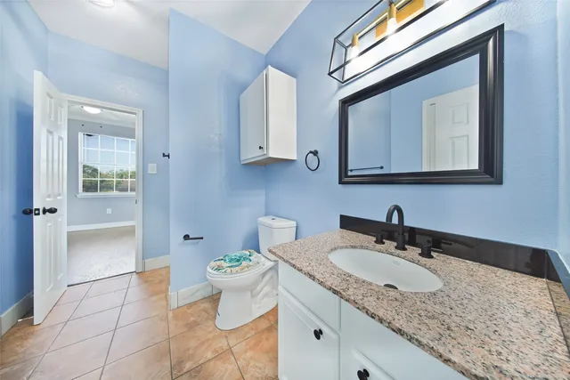 a bathroom with a sink and a toilet