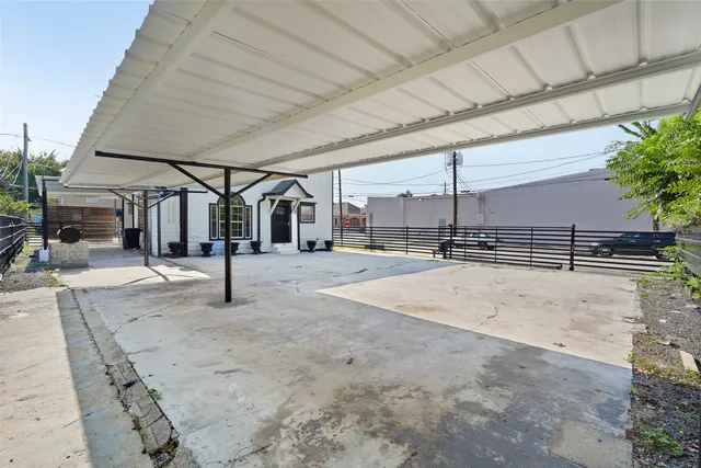 a view of an empty room with a garage