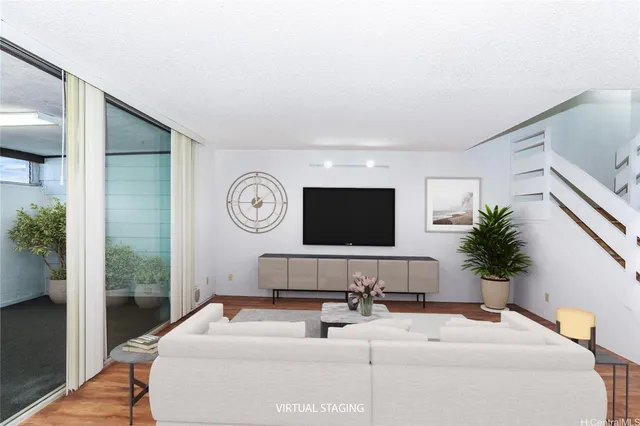 a hotel room with bed and a flat screen tv