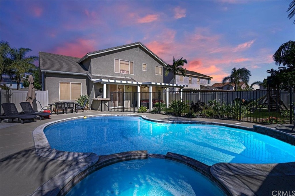 20775 Rosedale Drive Riverside, CA 92508 - Photo 1 of 1 a view of a house with swimming pool and sitting area