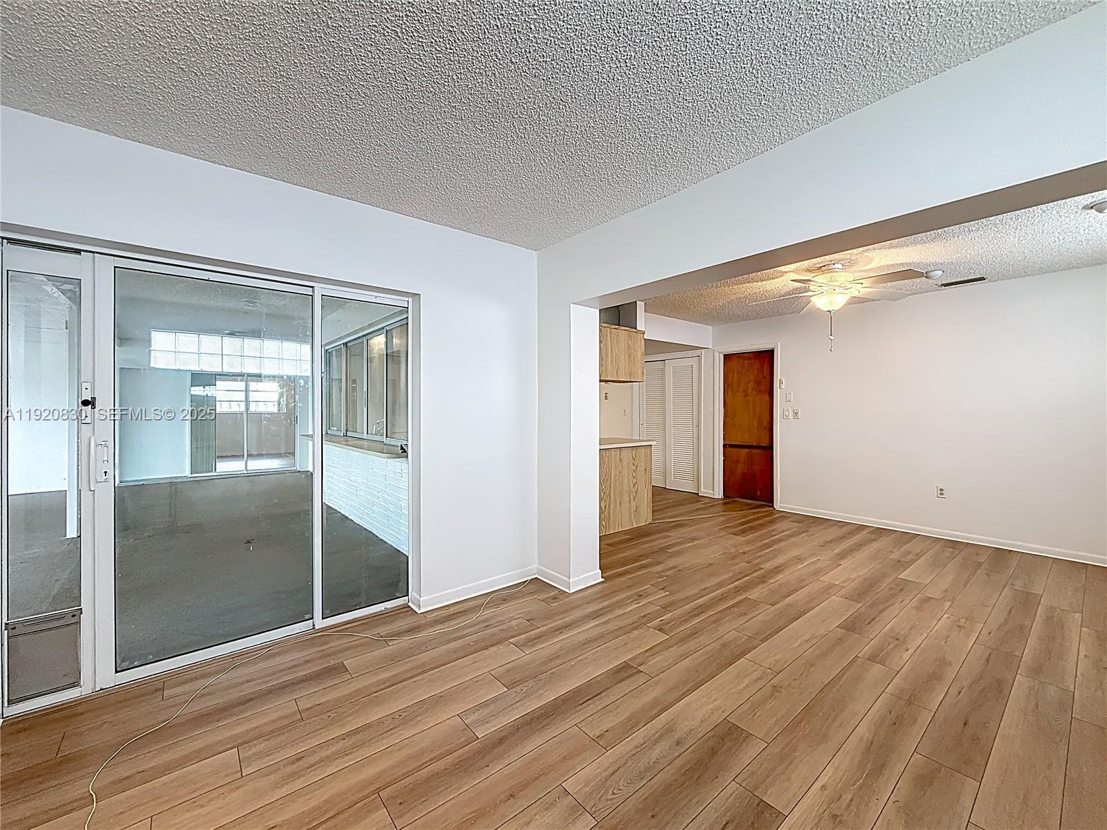 7541 Embassy Boulevard Miramar, FL 33023 - Photo 21 of 60 a view of empty room with wooden floor