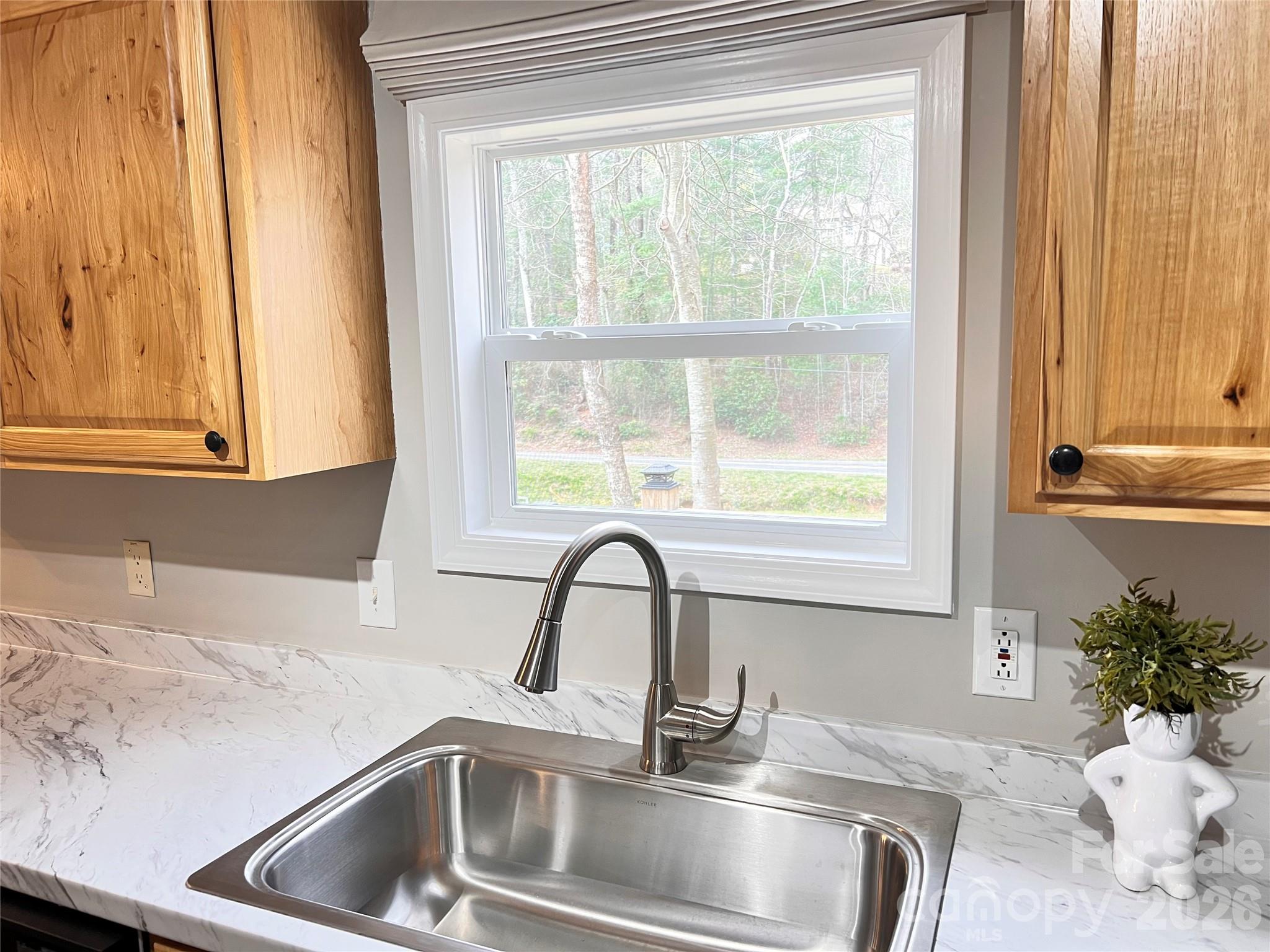 25 Overbrook Drive Saluda, NC 28773 - Photo 13 of 42 a close view of a sink and a window