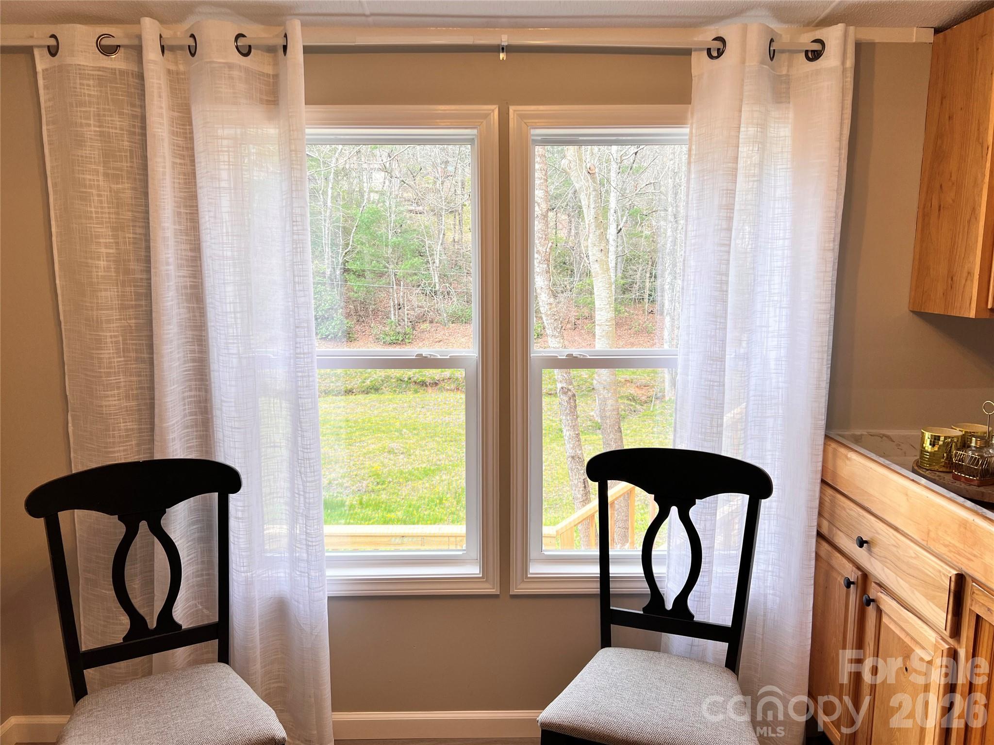 25 Overbrook Drive Saluda, NC 28773 - Photo 15 of 42 a view of a balcony with chair and table