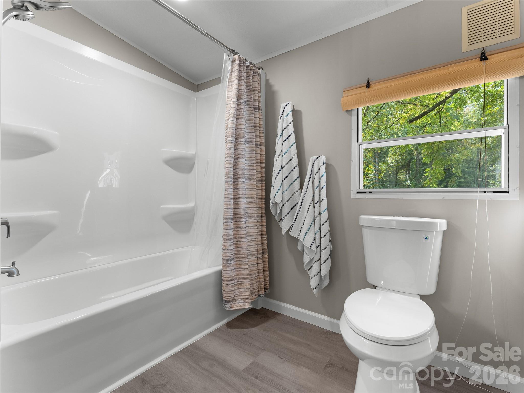 25 Overbrook Drive Saluda, NC 28773 - Photo 21 of 42 a bathroom with a toilet and a bathtub