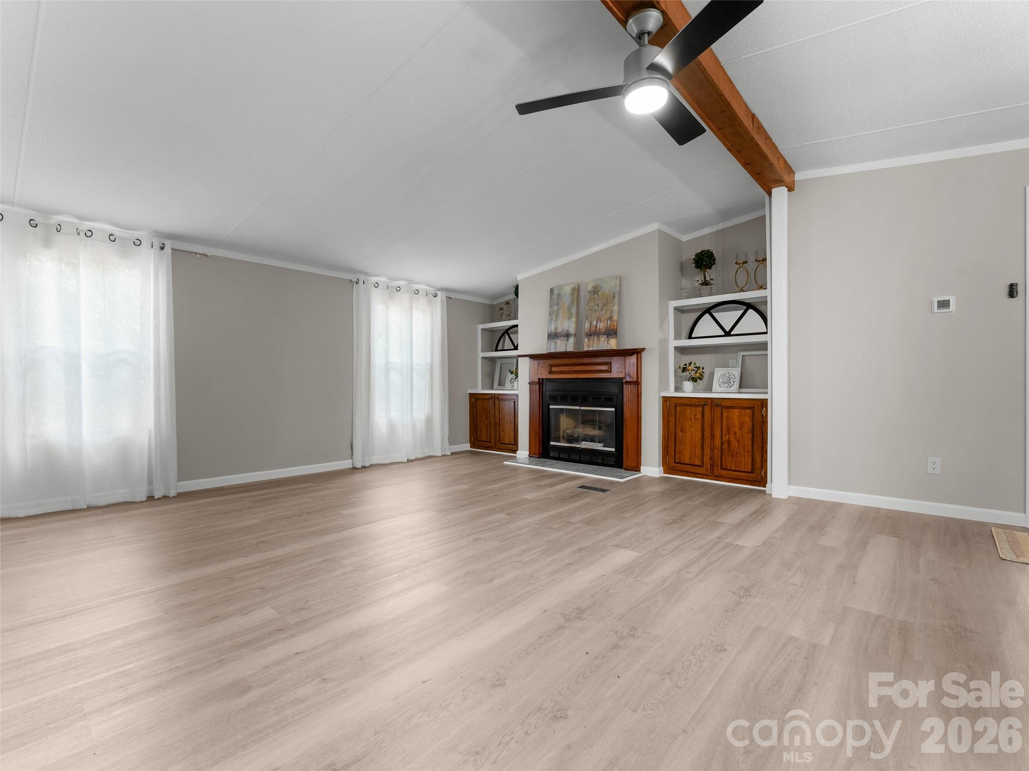 25 Overbrook Drive Saluda, NC 28773 - Photo 26 of 42 a view of empty room with cabinet and fireplace