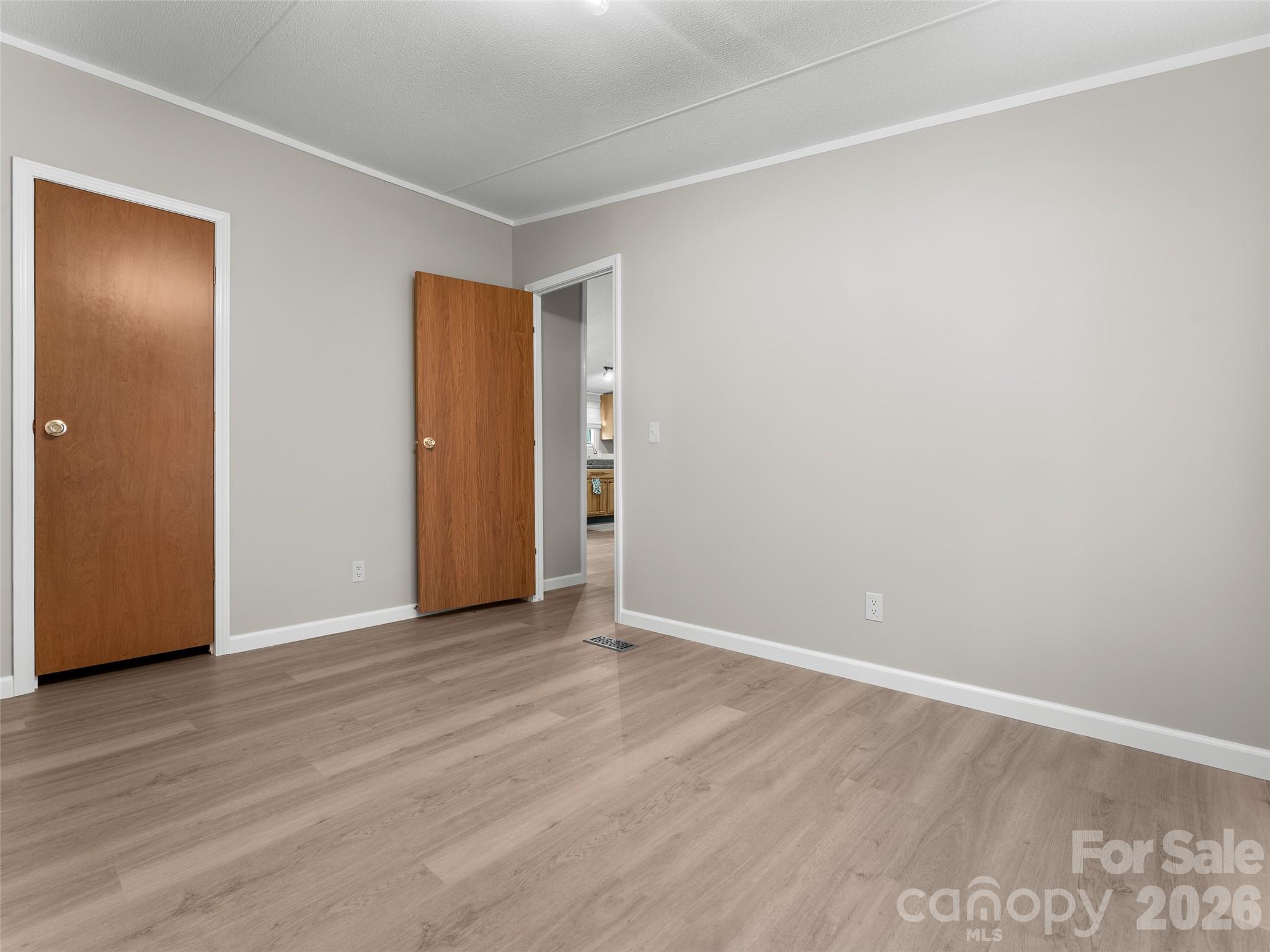 25 Overbrook Drive Saluda, NC 28773 - Photo 29 of 42 a view of an empty room with wooden floor and closet